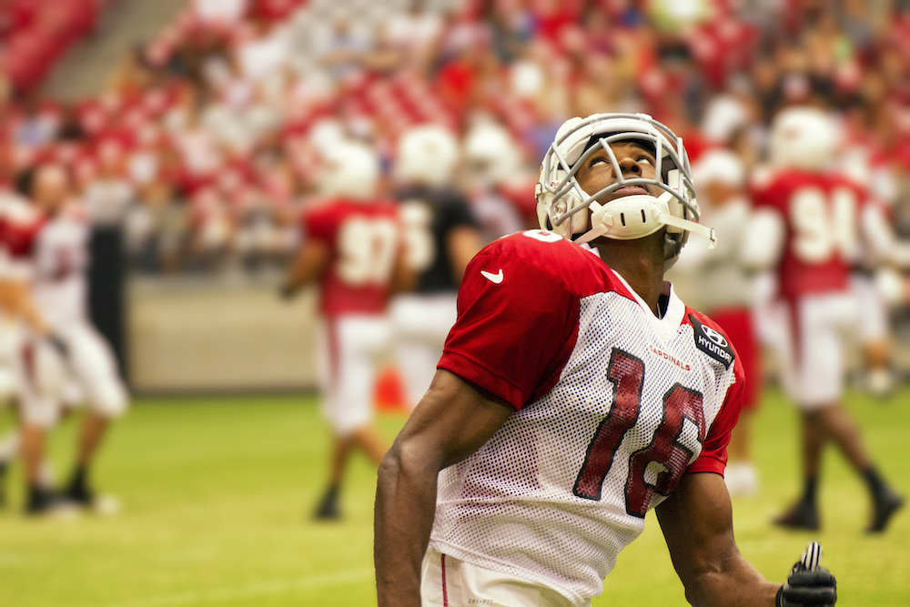 an NFL player who uses prescription opioids after games to manage pain.