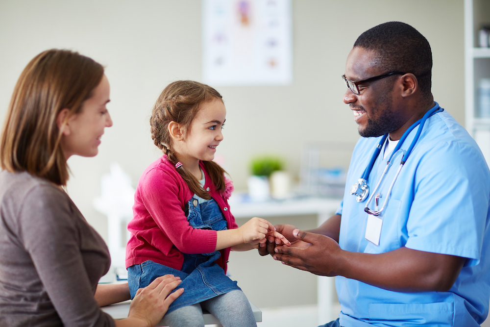 kid visiting the doctor for a wearable sensor