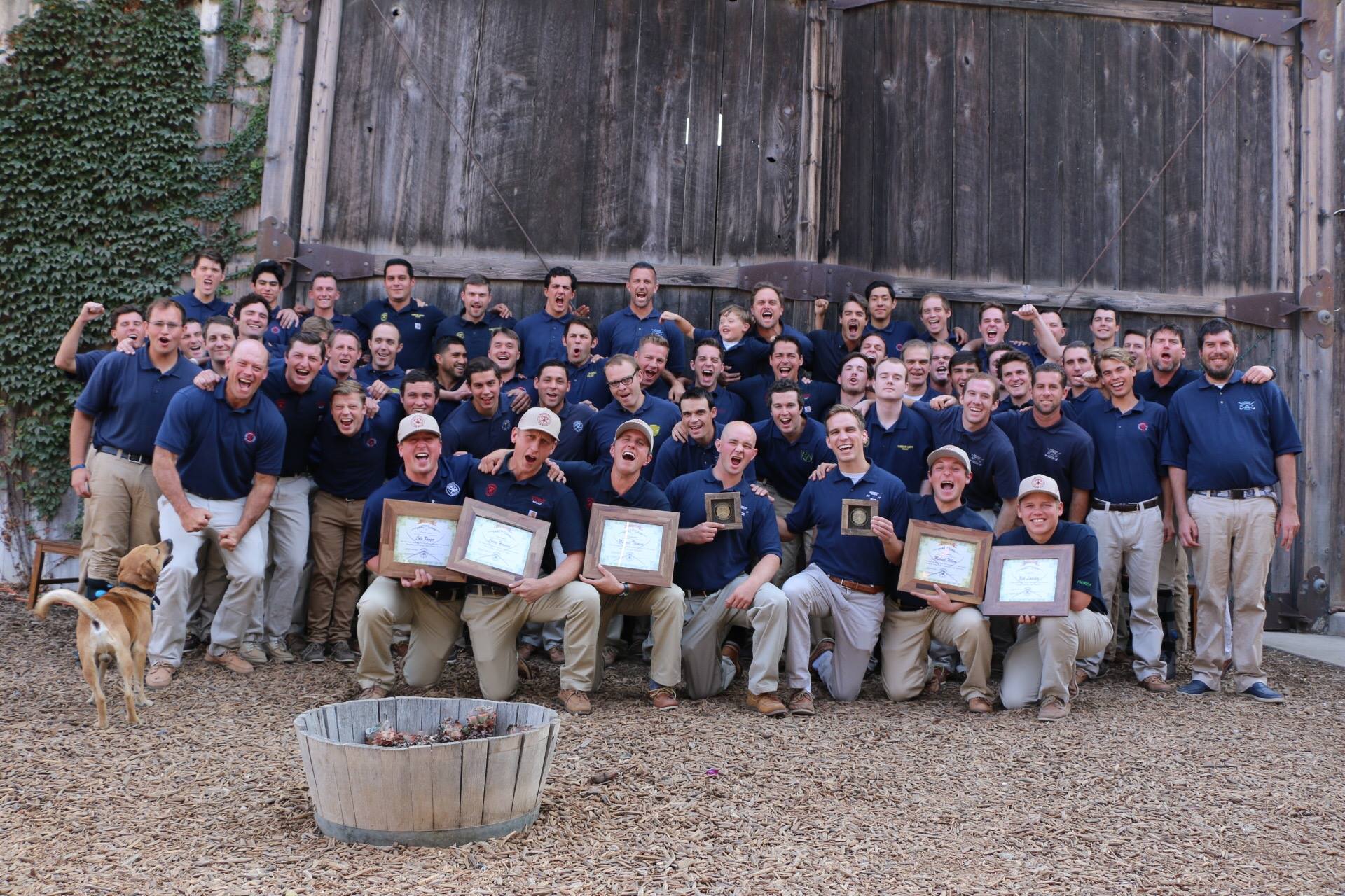 Group of smiling men in blue shirts, Recovery Ranch sober living for men