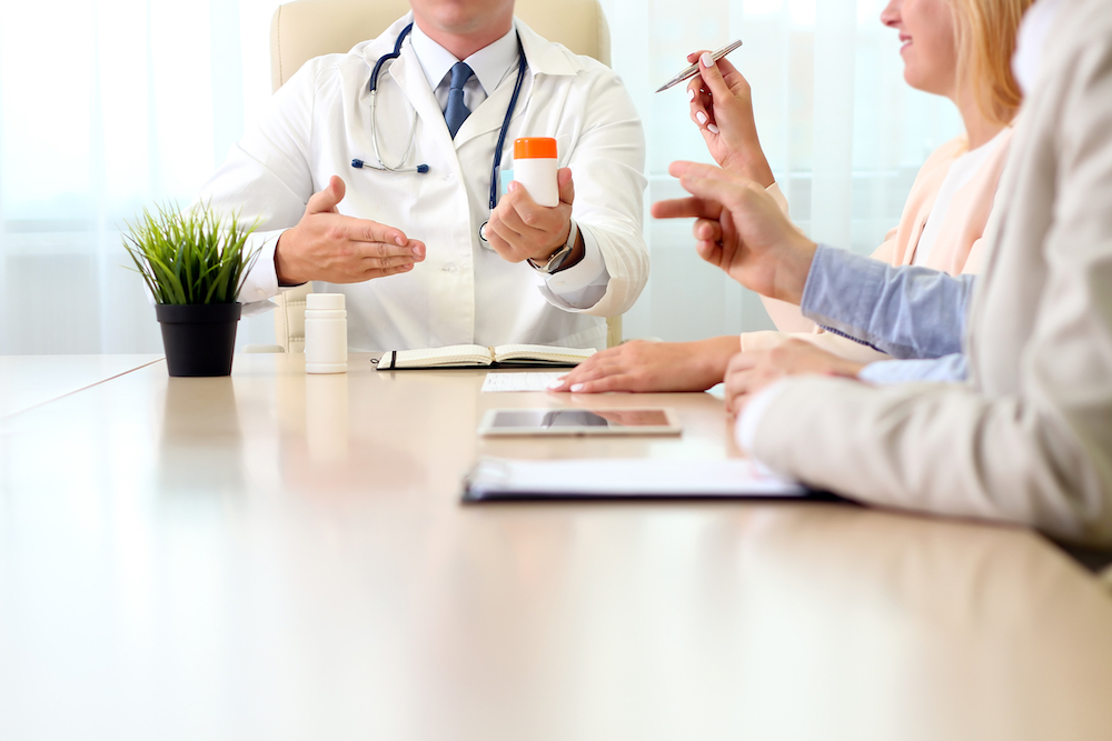 doctors discussing medication-assisted treatment