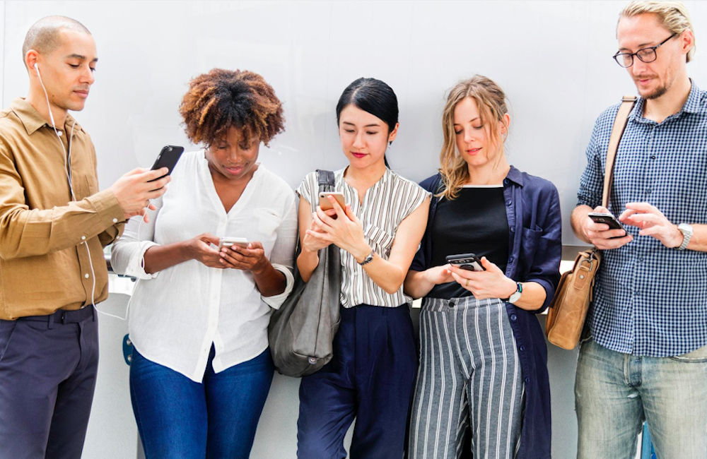 people using their smartphones