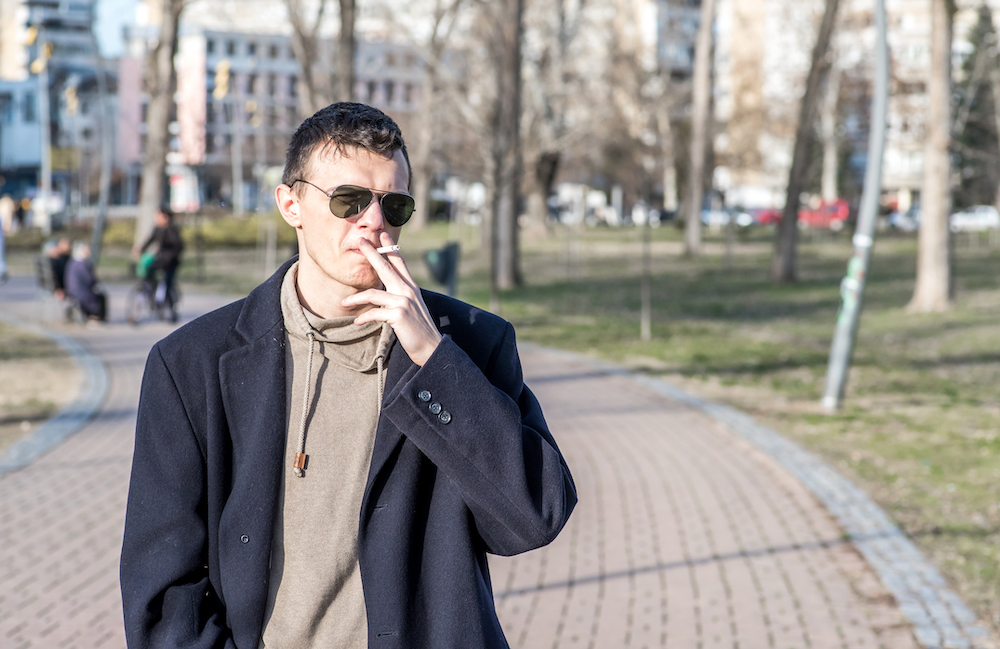 Man smoking in Atlanta where the state may ban smoking in public