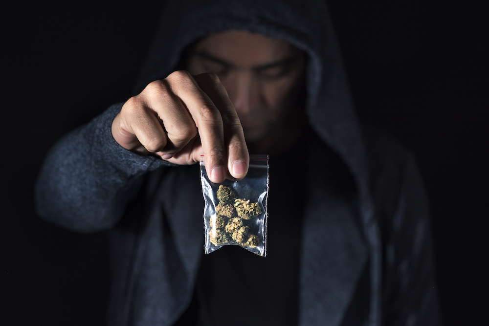man selling illegal pot