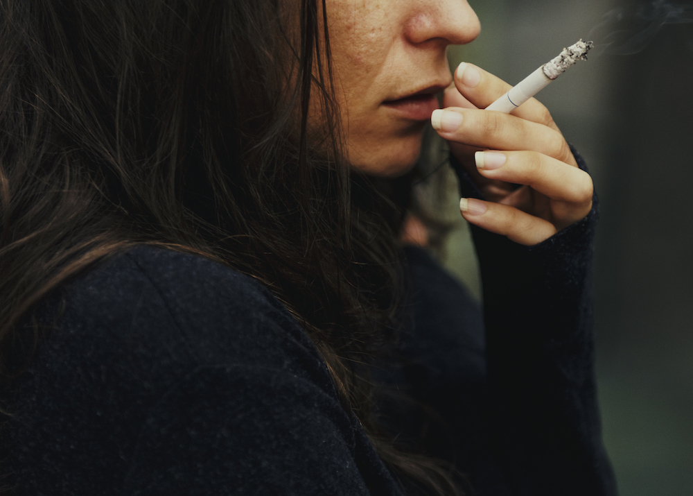 woman smoking a cigarette