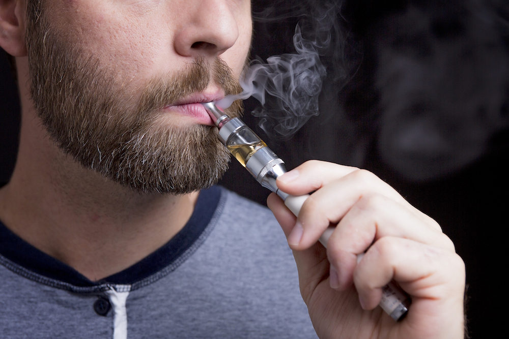 man vaping in San Francisco