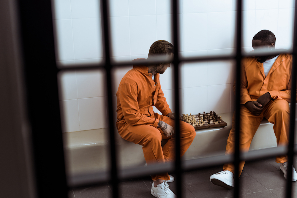 California prisoners playing chess in their cell