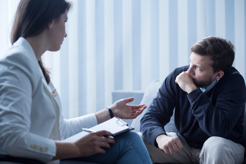 man in therapy for depression treatment