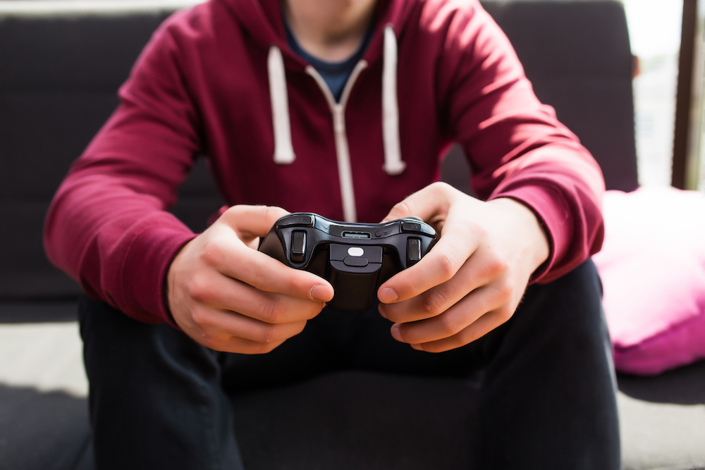 boy playing video games
