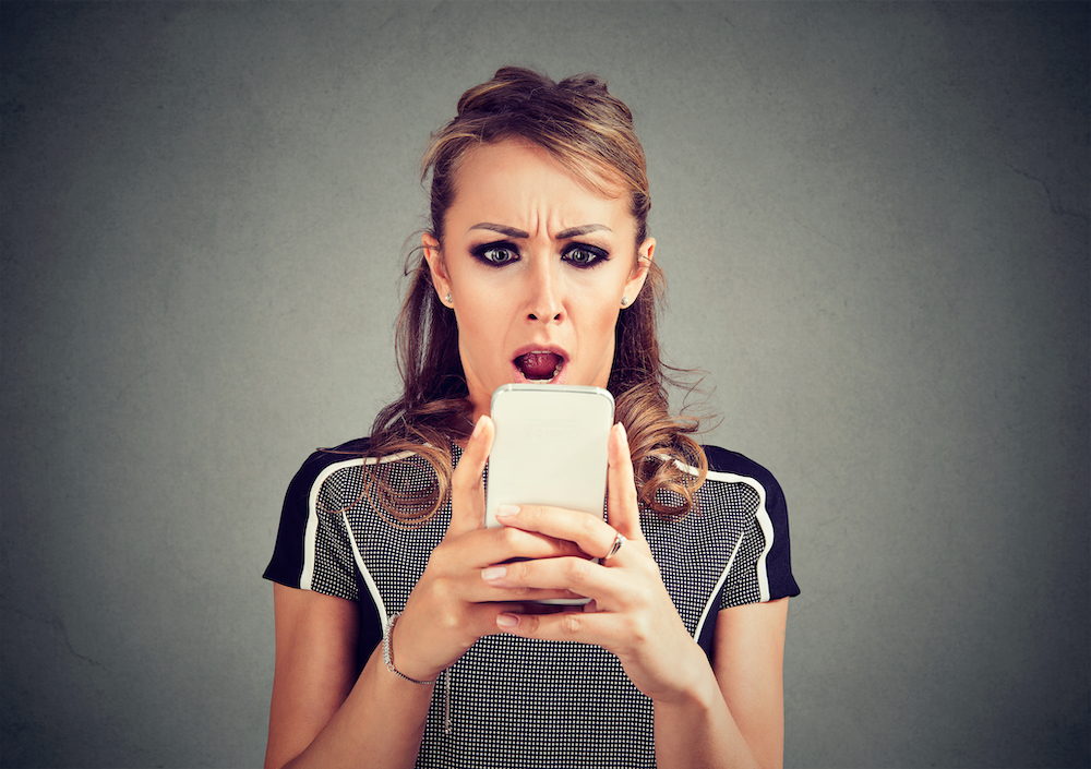 woman in recovery reading a link from a dealer on Instagram