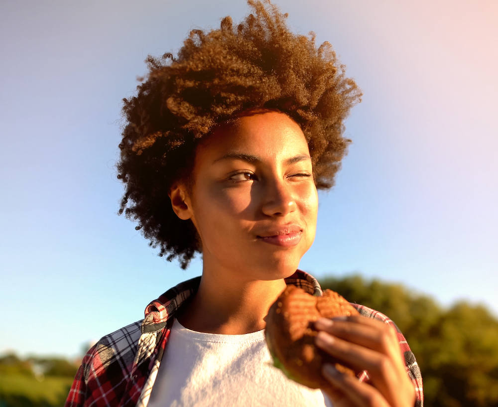 teen eating fast food