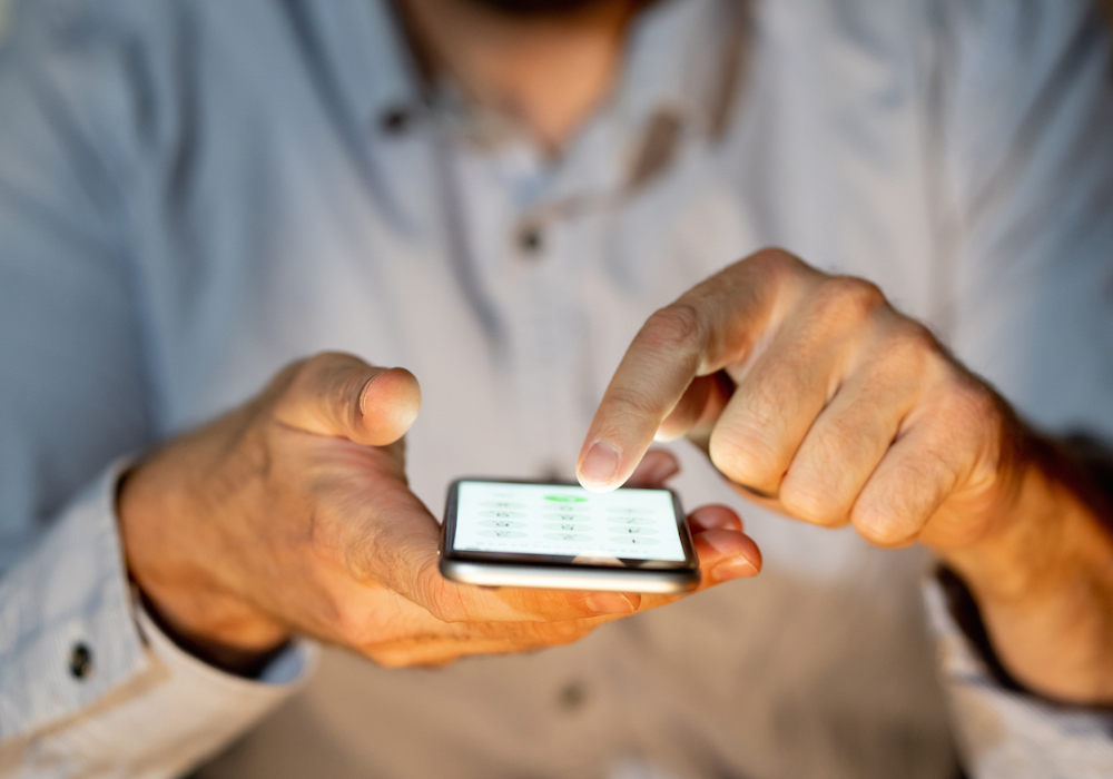 man using smartphone