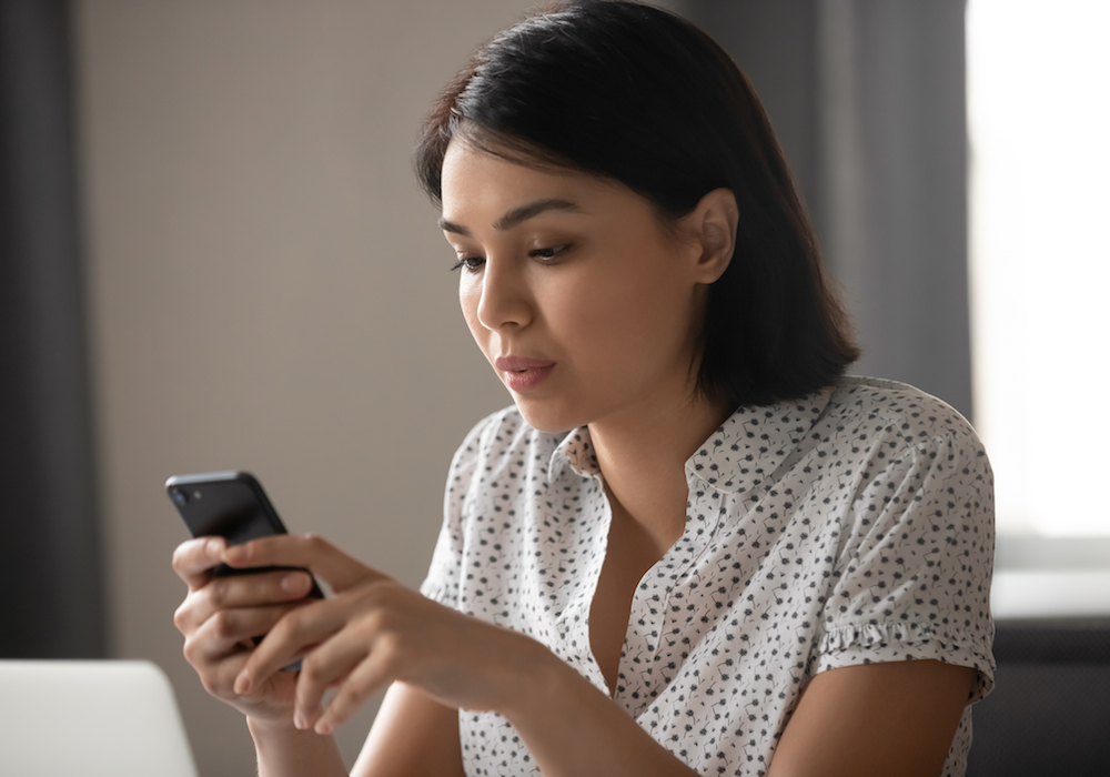 woman using smartphone