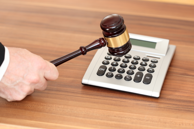 judge about to smash calculator with gavel