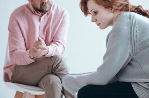 sober woman seeking support from counselor