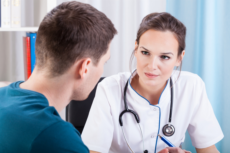 Doctor or medical staff consults with patient