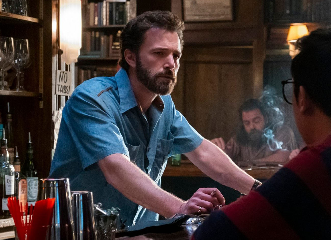 Movie still Ben Affleck behind a bar in The Tender Bar